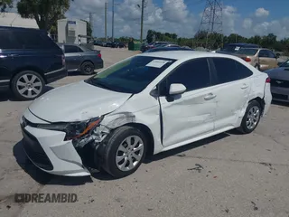 2023 Toyota Corolla LE with VIN 5YFB4MDE1PP058810, listed as a IAAI auction lot 42009318 with 10,950 mi miles and . Bid and sale history available at carsss.com. Image 17.
