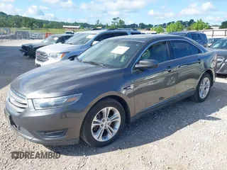 2015 Ford Taurus SEL with VIN 1FAHP2E87FG156969, listed as a IAAI auction lot 42506157 with 99,184 mi miles and . Bid and sale history available at DreamBid. Image 2.