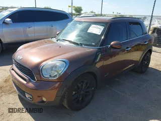 2013 MINI Countryman S ALL4 with VIN WMWZC5C58DWP30998, listed as a IAAI auction lot 42594984 with 153,792 mi miles and . Bid and sale history available at DreamBid. Image 2.