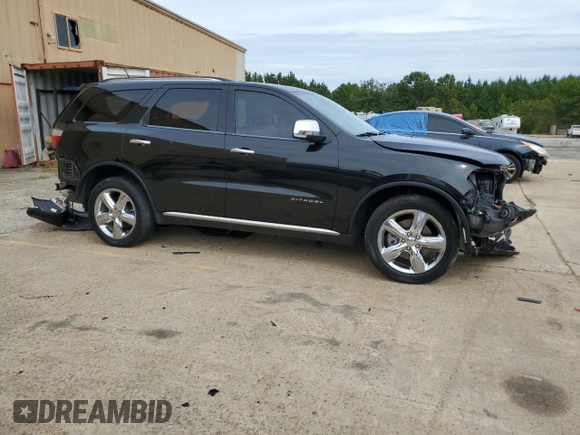 2012 Dodge Durango Citadel with VIN 1C4RDHEG7CC247504, listed as a Copart auction lot 70443154 with 115,888 mi miles and Salvage title. Bid and sale history available at DreamBid. Image 4.