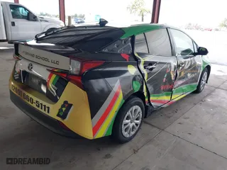 2019 Toyota Prius L Eco with VIN JTDKARFU8K3095428, listed as a IAAI auction lot 41804331 with 154,877 mi miles. Bid and sale history available at carsss.com. Image 4.