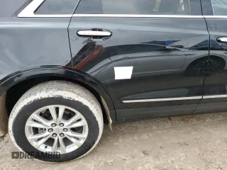 2022 Cadillac XT5 FWD Luxury z VIN 1GYKNAR4XNZ165234, wystawiony jako Copart lot #85392754 z przebiegiem 36 100 mil mil oraz Nie do naprawy • Non repairable. Historia ofert i sprzedaży dostępna na DreamBid. Obrazek 13.