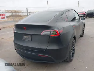 2021 Tesla Model Y Long Range with VIN 5YJYGDEE5MF111774, listed as a IAAI auction lot 41525622 with 39,960 mi miles. Bid and sale history available at carsss.com. Image 16.