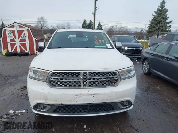 2014 Dodge Durango Citadel with VIN 1C4RDJEG0EC476018, listed as a IAAI auction lot 41212456 with 154,929 mi miles and . Bid and sale history available at DreamBid. Image 12.