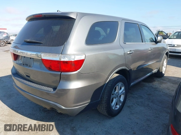 2012 Dodge Durango SXT with VIN 1C4RDJAG2CC271772, listed as a IAAI auction lot 42760810 with 151,215 mi miles and . Bid and sale history available at DreamBid. Image 4.