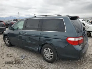 2006 Honda Odyssey EX-L z VIN 5FNRL38786B014188, wystawiony jako Copart lot #57140935 z przebiegiem Nie podano mil oraz Szkoda całkowita • Salvage title. Historia ofert i sprzedaży dostępna na DreamBid. Obrazek 2.