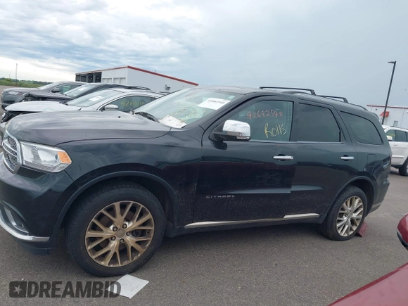 2014 Dodge Durango Citadel with VIN 1C4SDJET5EC314304, listed as a IAAI auction lot 42682540 with 213,651 mi miles and . Bid and sale history available at DreamBid. Image 14.