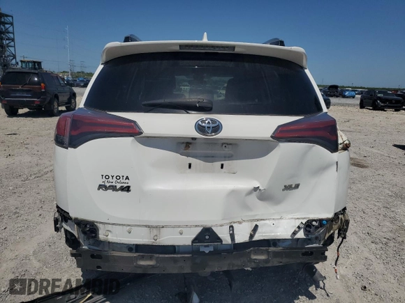 2018 Toyota RAV4 XLE with VIN 2T3WFREV7JW512949, listed as a Copart auction lot 52546345 with 41,558 mi miles and Salvage Title. Bid and sale history available at DreamBid. Image 6.