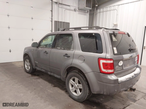 2008 Ford Escape Hybrid with VIN 1FMCU59H18KC30939, listed as a IAAI auction lot 41575587 with 208,879 mi miles. Bid and sale history available at carsss.com. Image 3.