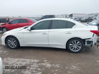 2014 Infiniti Q50 Premium z VIN JN1BV7AP4EM676324, wystawiony jako IAAI lot #42167934 z przebiegiem 114 670 mil mil oraz . Historia ofert i sprzedaży dostępna na DreamBid. Obrazek 15.