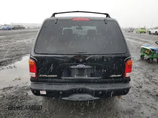 2000 Ford Explorer Limited with VIN 1FMDU75EXYZA76329, listed as a Copart auction lot 80952474 with 90,637 mi miles and Salvage title. Bid and sale history available at DreamBid. Image 6.