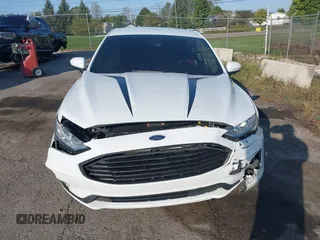 2020 Ford Fusion SE z VIN 3FA6P0T93LR247572, wystawiony jako IAAI lot #40481880 z przebiegiem 59 141 mil mil oraz . Historia ofert i sprzedaży dostępna na DreamBid. Obrazek 12.
