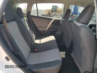 2014 Toyota RAV4 LE with VIN JTMZFREV7EJ018804, listed as a Copart auction lot 62738795 with 97,265 mi miles and Salvage title. Bid and sale history available at DreamBid. Image 11.