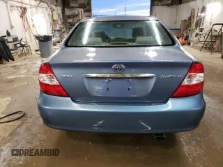 2004 Toyota Camry LE with VIN 4T1BE32K64U812388, listed as a Copart auction lot 82777563 with 209,219 mi miles and Clean Title. Bid and sale history available at carsss.com. Image 6.