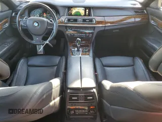 2015 BMW 7 Series 750i xDrive with VIN WBAYB6C57FD965993, listed as a Copart auction lot 83871924 with 76,720 mi miles and Salvage Title. Bid and sale history available at carsss.com. Image 8.