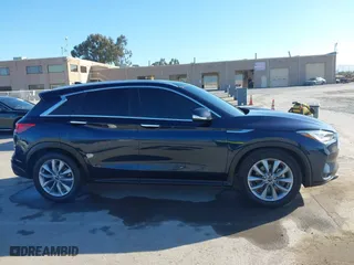 2021 Infiniti QX50 LUXE with VIN 3PCAJ5BB1MF119650, listed as a IAAI auction lot 41856455 with 64,674 mi miles. Bid and sale history available at carsss.com. Image 13.