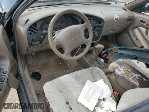 1994 Toyota Camry LE z VIN JT2GK12E2R0039606, wystawiony jako Copart lot #49840015 z przebiegiem 197 834 mil mil oraz Szkoda całkowita • Salvage title. Historia ofert i sprzedaży dostępna na DreamBid. Obrazek 8.