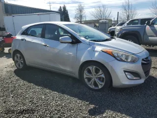 2013 Hyundai Elantra GT with VIN KMHD35LE7DU122295, listed as a Copart auction lot 50028935 with 97,616 mi miles and Salvage Title. Bid and sale history available at carsss.com. Image 4.
