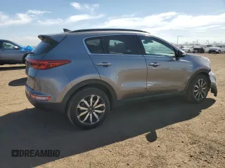2019 Kia Sportage EX z VIN KNDPNCAC3K7547199, wystawiony jako Copart lot #53388485 z przebiegiem 74 727 mil mil oraz Szkoda całkowita • Salvage title. Historia ofert i sprzedaży dostępna na DreamBid. Obrazek 3.