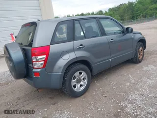 2007 Suzuki Grand Vitara with VIN JS3TE941474203094, listed as a IAAI auction lot 42092310 with 176,903 mi miles. Bid and sale history available at carsss.com. Image 4.
