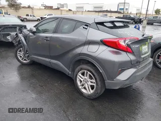 2021 Toyota C-HR LE with VIN JTNKHMBX9M1116408, listed as a IAAI auction lot 41567039 with 77,558 mi miles. Bid and sale history available at carsss.com. Image 3.