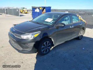 2022 Kia Rio S with VIN 3KPA24AD8NE453398, listed as a IAAI auction lot 41245351 with 57955 miles. Bid and sale history available at carsss.com. Image 17.