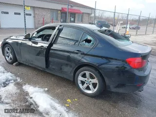 2014 BMW 3 Series 328i xDrive with VIN WBA3B3G58ENR83365, listed as a IAAI auction lot 41684711 with 141,669 mi miles. Bid and sale history available at carsss.com. Image 3.