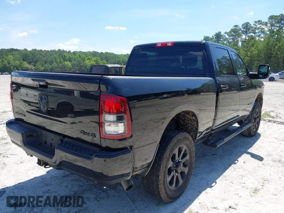 2023 Ram 2500 Big Horn with VIN 3C6UR5DL6PG504090, listed as a IAAI auction lot 42512380 with 50,231 mi miles and . Bid and sale history available at DreamBid. Image 4.