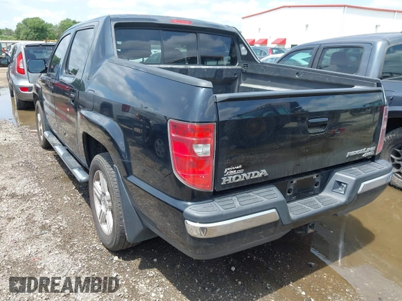 2011 Honda Ridgeline RTL with VIN 5FPYK1F54BB011472, listed as a IAAI auction lot 42112512 with 194,974 mi miles and . Bid and sale history available at DreamBid. Image 3.