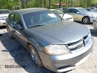 2013 Dodge Avenger SE with VIN 1C3CDZAB1DN658140, listed as a IAAI auction lot 41998306 with 215,548 mi miles. Bid and sale history available at carsss.com. Image 1.