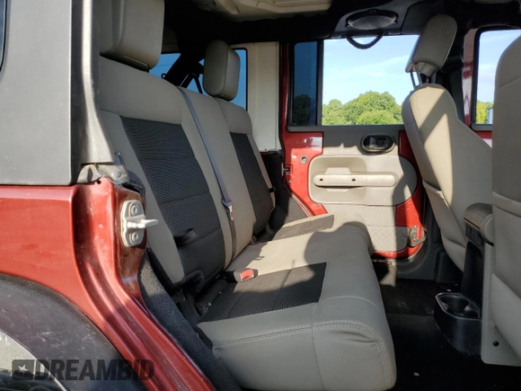 2010 Jeep Wrangler Unlimited Sahara with VIN 1J4BA5H13AL141851, listed as a Copart auction lot 63486504 with 0 mi miles and Salvage Title. Bid and sale history available at carsss.com. Image 10.