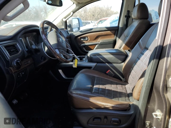 2016 Nissan Titan Pro-4X z VIN 1N6BA1F4XGN502773, wystawiony jako Copart lot #49285535 z przebiegiem 129 390 mil mil oraz Czysty tytuł • Clean title. Historia ofert i sprzedaży dostępna na DreamBid. Obrazek 7.