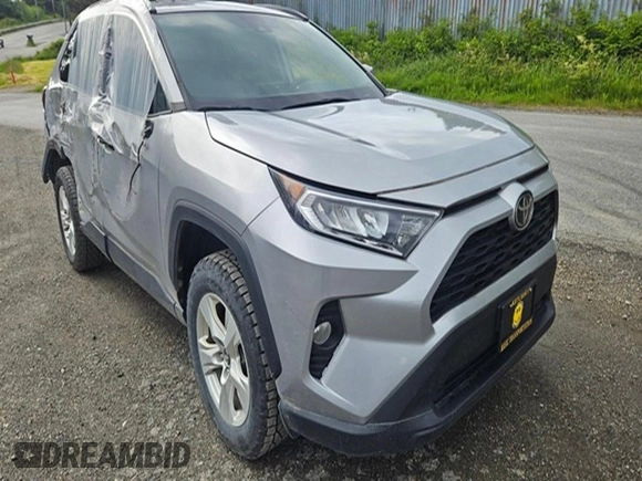 2021 Toyota RAV4 XLE with VIN 2T3P1RFV7MW161787, listed as a Copart auction lot 60937395 with 91,377 mi miles and Salvage title. Bid and sale history available at DreamBid. Image 4.