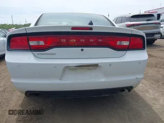 2014 Dodge Charger Police with VIN 2C3CDXAT8EH216267, listed as a IAAI auction lot 42104131 with 116,299 mi miles and . Bid and sale history available at DreamBid. Image 16.