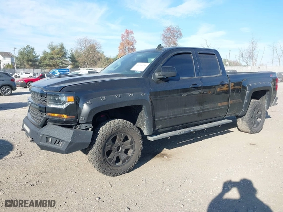 2017 Chevrolet Silverado 1500 LT with VIN 1GCVKREC0HZ293560, listed as a IAAI auction lot 40706331 with 133,438 mi miles. Bid and sale history available at carsss.com. Image 2.
