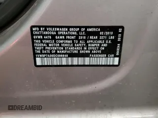 2013 Volkswagen Passat SE with VIN 1VWBP7A30DC096848, listed as a Copart auction lot 64006485 with 136,742 mi miles and Salvage title. Bid and sale history available at DreamBid. Image 12.