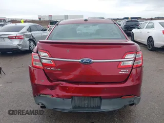 2015 Ford Taurus SEL with VIN 1FAHP2E8XFG137526, listed as a IAAI auction lot 41909658 with 147,992 mi miles and . Bid and sale history available at carsss.com. Image 16.