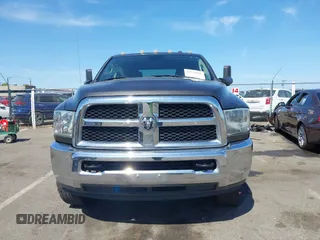 2015 Ram 2500 Tradesman z VIN 3C6TR5CT5FG528294, wystawiony jako IAAI lot #42374966 z przebiegiem Nie podano mil oraz . Historia ofert i sprzedaży dostępna na DreamBid. Obrazek 12.