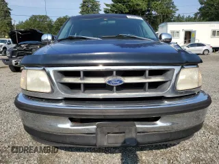 1998 Ford F-150 with VIN 1FTZX1765WKA33379, listed as a Copart auction lot 62009135 with 152,607 mi miles and Salvage title. Bid and sale history available at DreamBid. Image 5.