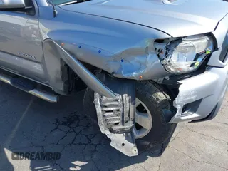 2014 Toyota Tacoma with VIN 3TMLU4EN7EM146705, listed as a IAAI auction lot 41949827 with 147,887 mi miles and . Bid and sale history available at DreamBid. Image 6.