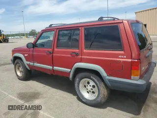 1998 Jeep Cherokee Sport with VIN 1J4FJ68S2WL285432, listed as a Copart auction lot 57183145 with 284,162 mi miles and Clean title. Bid and sale history available at DreamBid. Image 2.