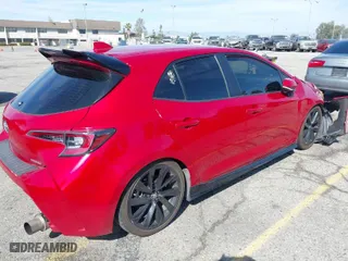 2021 Toyota Corolla Hatchback SE with VIN JTND4MBE1M3110769, listed as a IAAI auction lot 41874276 with 44,964 mi miles. Bid and sale history available at carsss.com. Image 4.