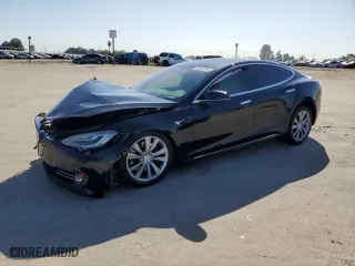 2017 Tesla Model S 100D with VIN 5YJSA1E2XHF198749, listed as a Copart auction lot 52447845 with 112,201 mi miles and Salvage Title. Bid and sale history available at carsss.com. Image 1.