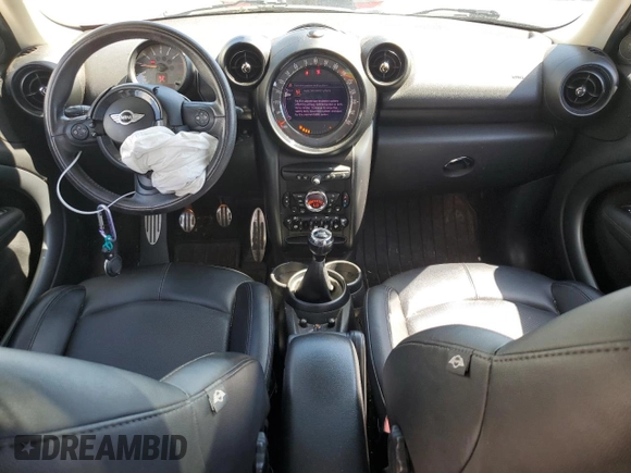 2016 MINI Countryman S with VIN WMWZC5C54GWT38489, listed as a Copart auction lot 63834335 with 102,564 mi miles and Salvage title. Bid and sale history available at DreamBid. Image 8.