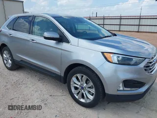 2022 Ford Edge Titanium with VIN 2FMPK4K99NBB06136, listed as a IAAI auction lot 42733977 with 57,794 mi miles and . Bid and sale history available at DreamBid. Image 1.