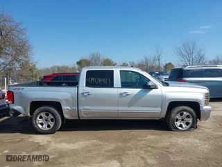2015 Chevrolet Silverado 1500 LT with VIN 3GCUKREC0FG316716, listed as a IAAI auction lot 41908921 with 242,093 mi miles. Bid and sale history available at carsss.com. Image 13.
