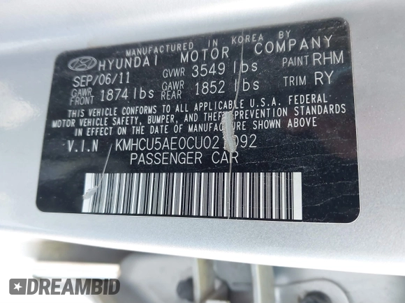 2012 Hyundai Accent SE with VIN KMHCU5AE0CU021092, listed as a IAAI auction lot 41789027 with 137,557 mi miles. Bid and sale history available at carsss.com. Image 9.