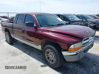 2001 Dodge Dakota Sport z VIN 1B7GL2AN41S219920, wystawiony jako IAAI lot #42257768 z przebiegiem 252 995 mil mil oraz . Historia ofert i sprzedaży dostępna na DreamBid. Obrazek 1.