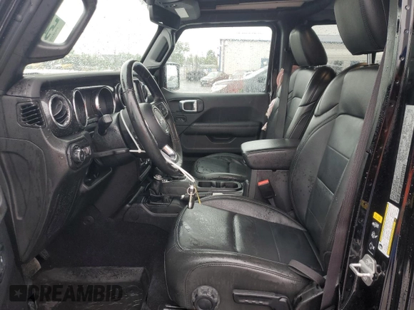 2022 Jeep Wrangler Unlimited Sahara with VIN 1C4HJXEGXNW211886, listed as a Copart auction lot 54877645 with 64,815 mi miles and Salvage title. Bid and sale history available at DreamBid. Image 7.