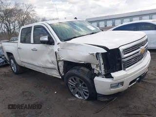 2014 Chevrolet Silverado 1500 High Country with VIN 3GCUKTEC5EG407573, listed as a IAAI auction lot 41651363 with 136,239 mi miles. Bid and sale history available at carsss.com. Image 1.
